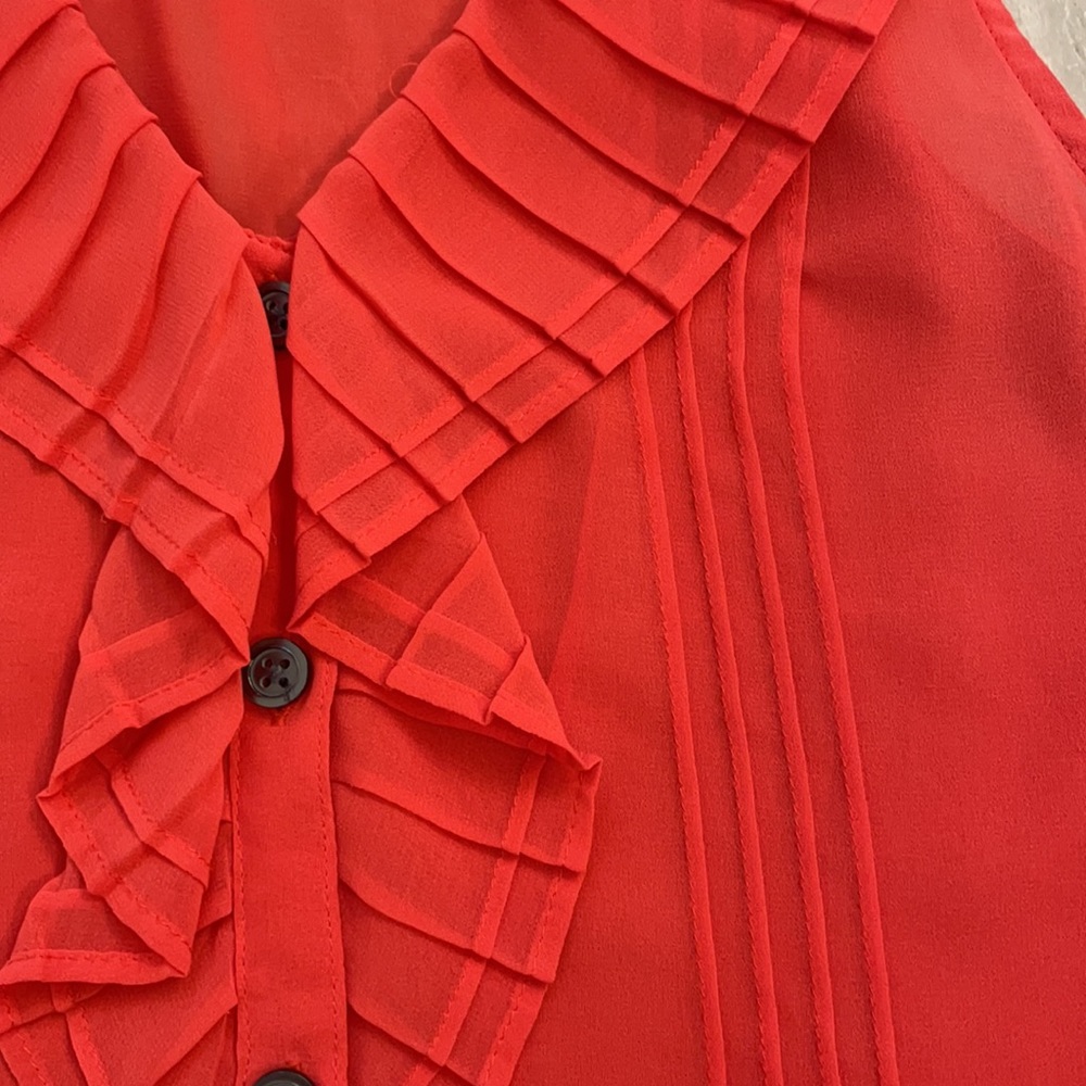 Pretty orange sheer blouse with detail